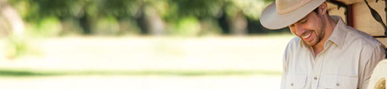 man wearing country wear polo and hat